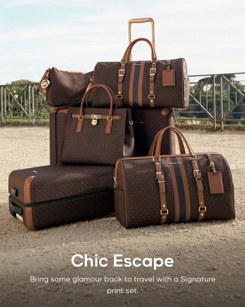 Chic Escape Bring some glamour back to travel with a Signature print set.