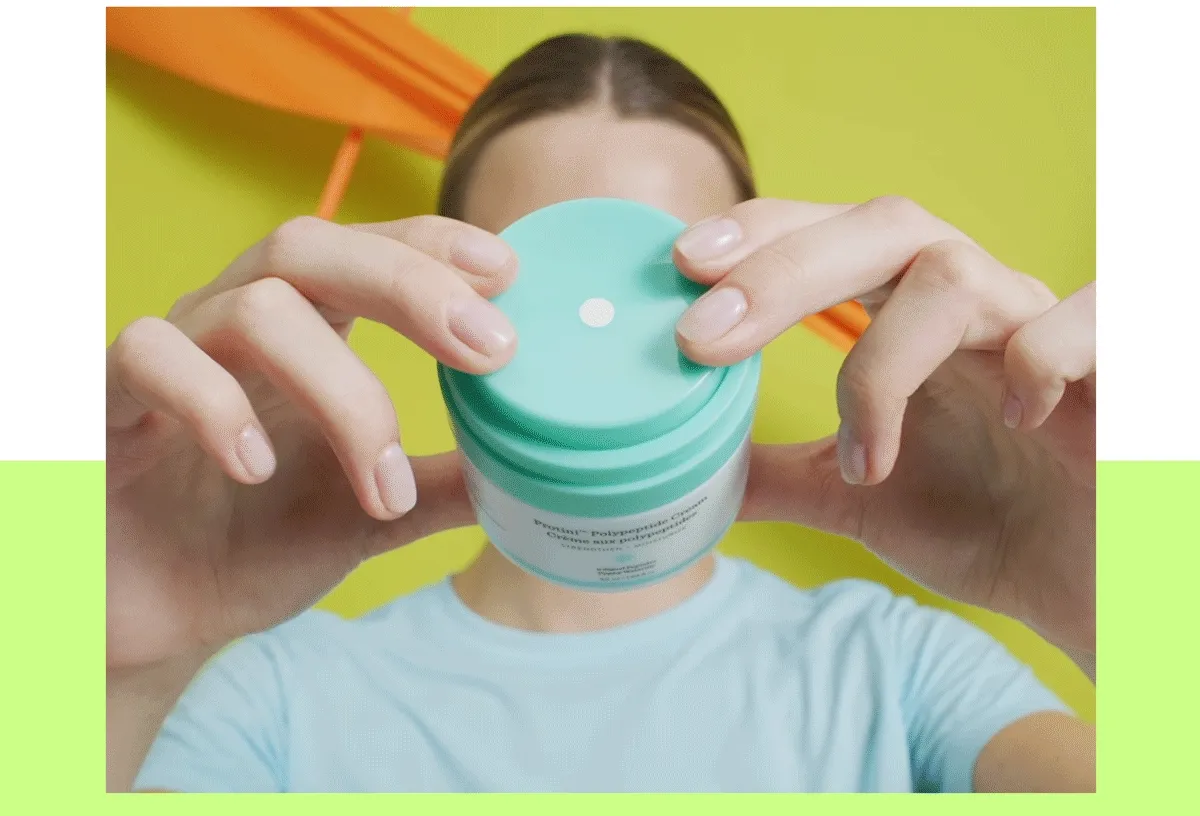 Protini Cream being applied to face
