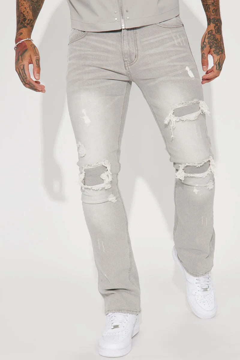 Image of Ripped Stacked Skinny Flare Jeans - Grey