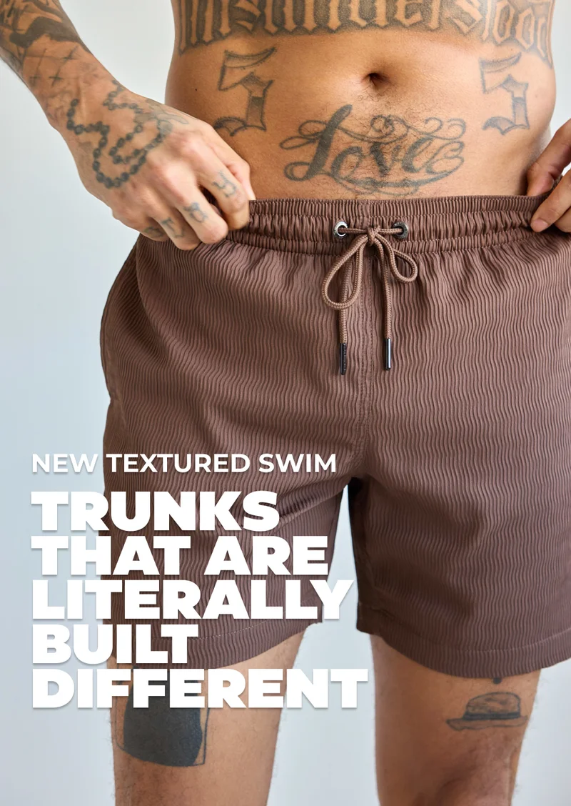 NEW TEXTURED SWIM TRUNKS