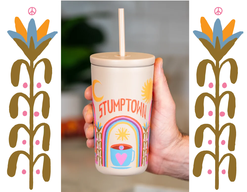 Image: Hand holding Stumptown cold cup