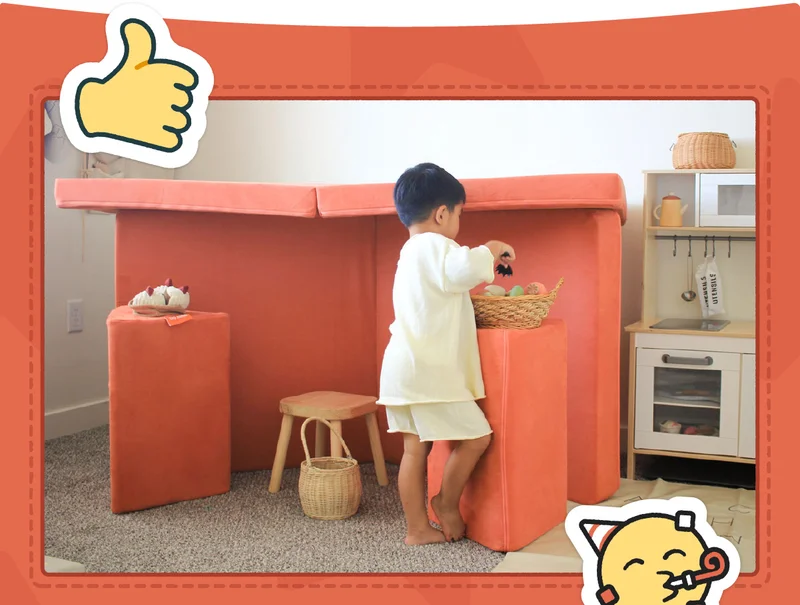 A child plays in a play bakery made from their Penny Nugget