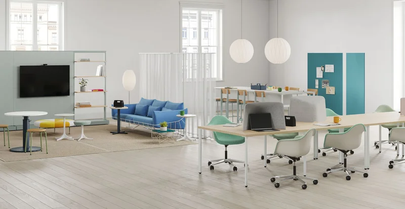 Open floor plan office space with task chairs, soft seating, and OE1 Workspace Collection project tables, height-adjustable tables, and movable walls.