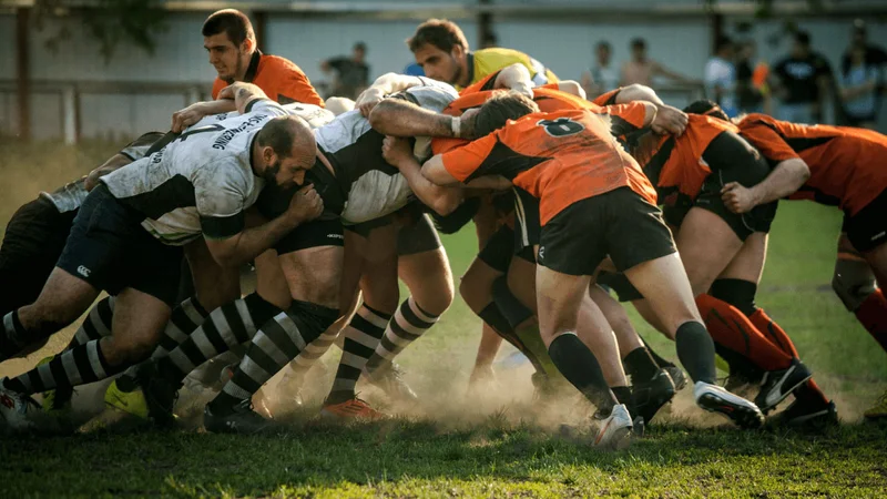 photo of men playing rugby