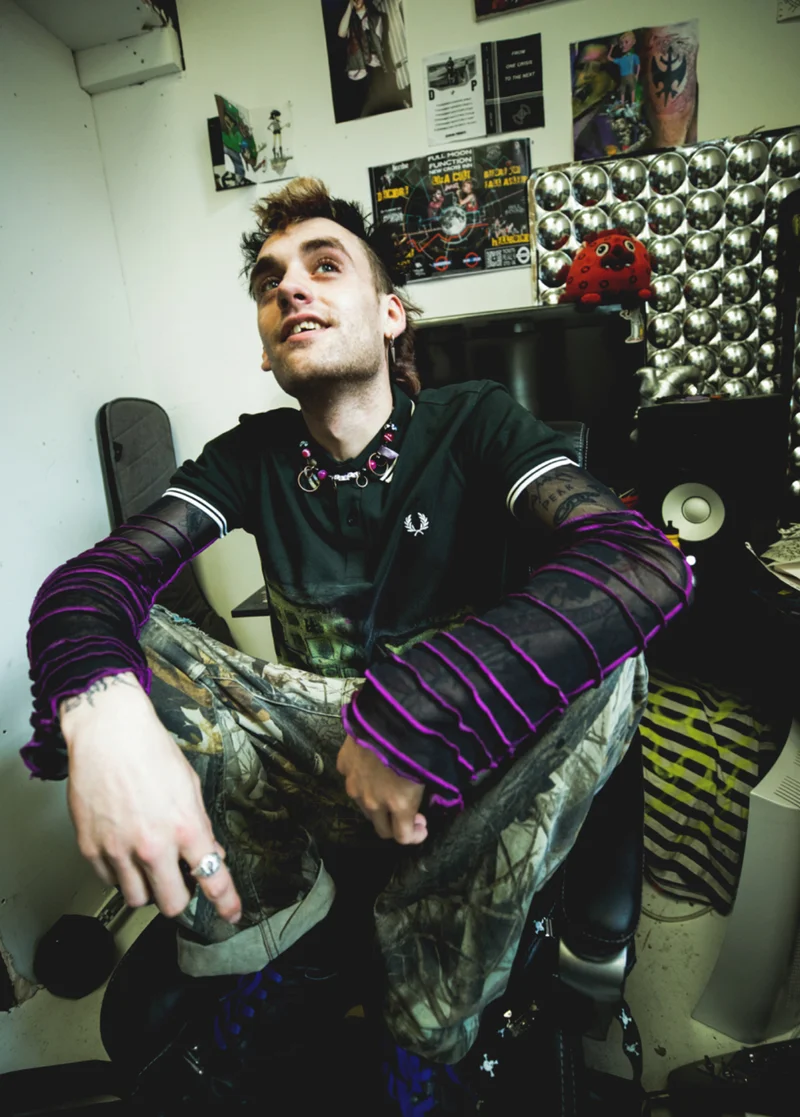 A male Fred Perry Ambassador styling Fred Perry in a punk rock way