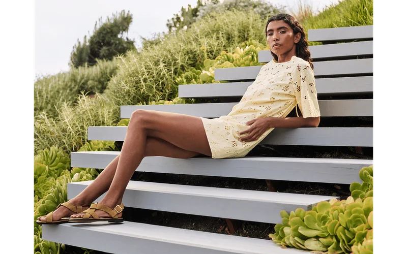 [Editorial Image]Model in The Eyelet Mini Shift Dress | Light Yellow