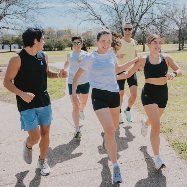 Group of people running together