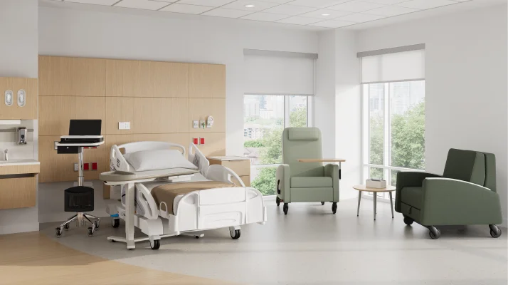 Gemma Recliner, Gemma Sleep Chair and Mora System in a patient room. Featuring Gemma Recliner with adjustable tray table, and both Gemma products with CBS casters.
