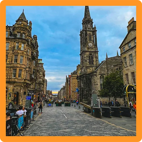Image description: A cobblestone street and medieval buildings.