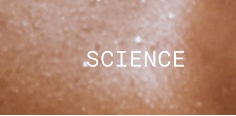 Text ‘SCIENCE’ over a light brown textured surface.