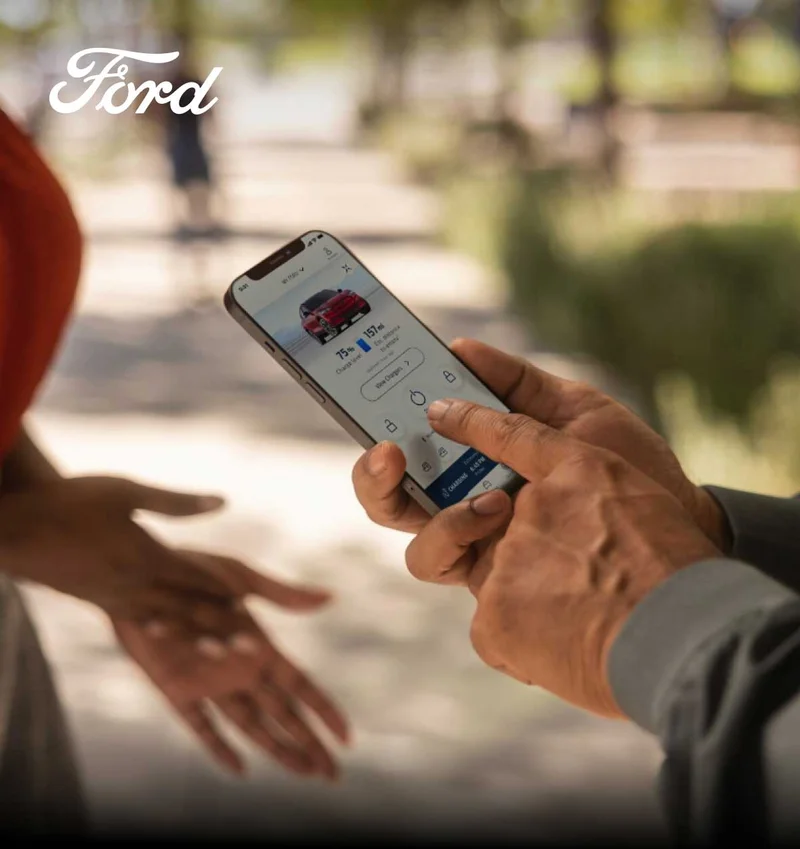 A person using the FordPass App.
