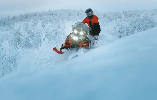 Action shots of Lynx snowmobiles