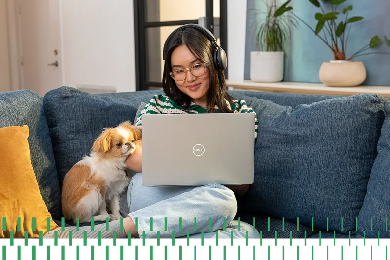 Women sitting on couch with Laptop
