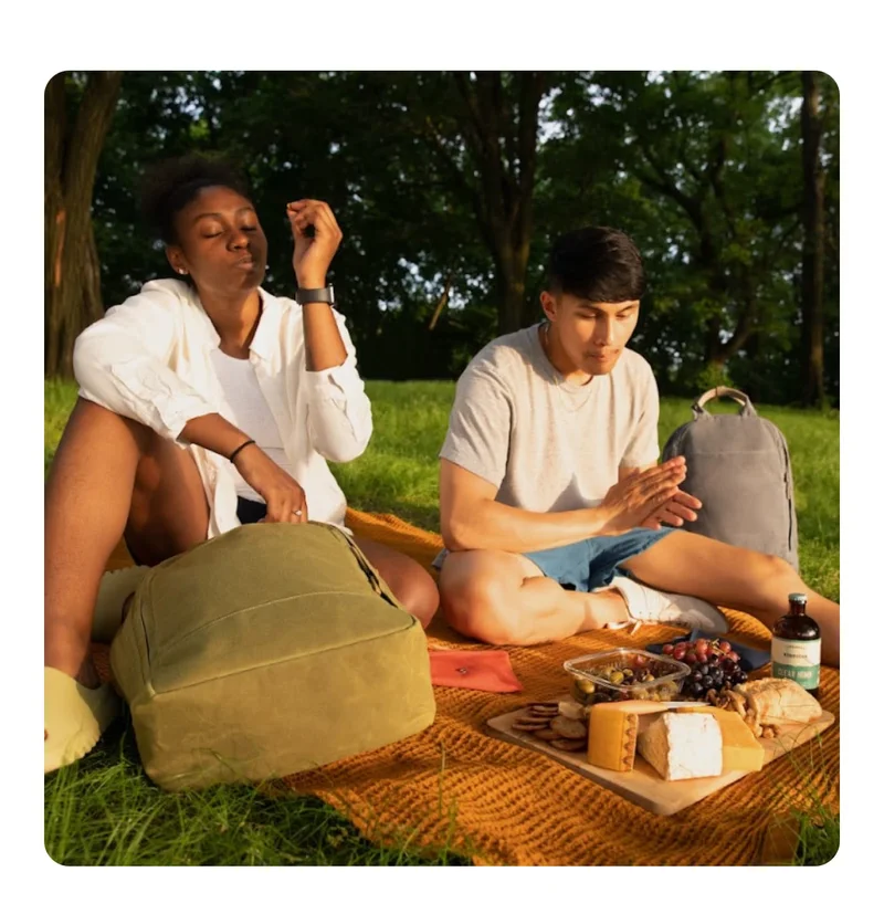 Girl and boy having picnic