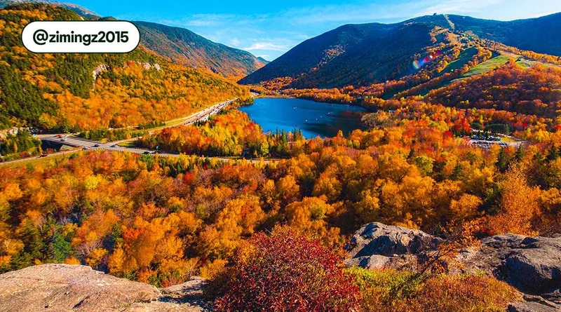 Image description: A look over the foliage around Echo Lake, New Hampshire, photo taken by @zimingz2015
