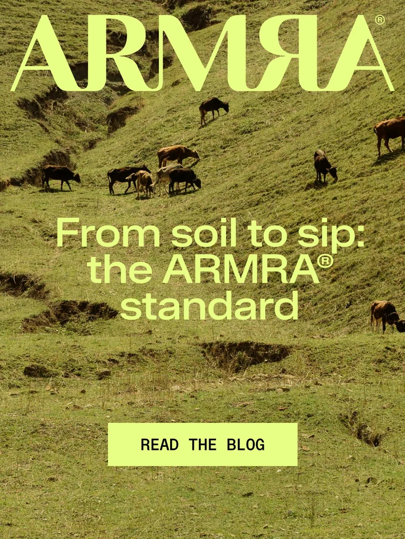 ARMR® From soil to sip: the ARMRA® standard READ THE BLOG. Cows grazing on a green hillside pasture with large lime text overlay and a call-to-action button.
