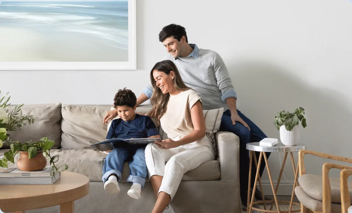 Family standing outside with their bags - People on the couch smiling - Kid leaving the house with arlo doorbell in background - Kid walking by with a basketball and an Arlo cam above the garage.