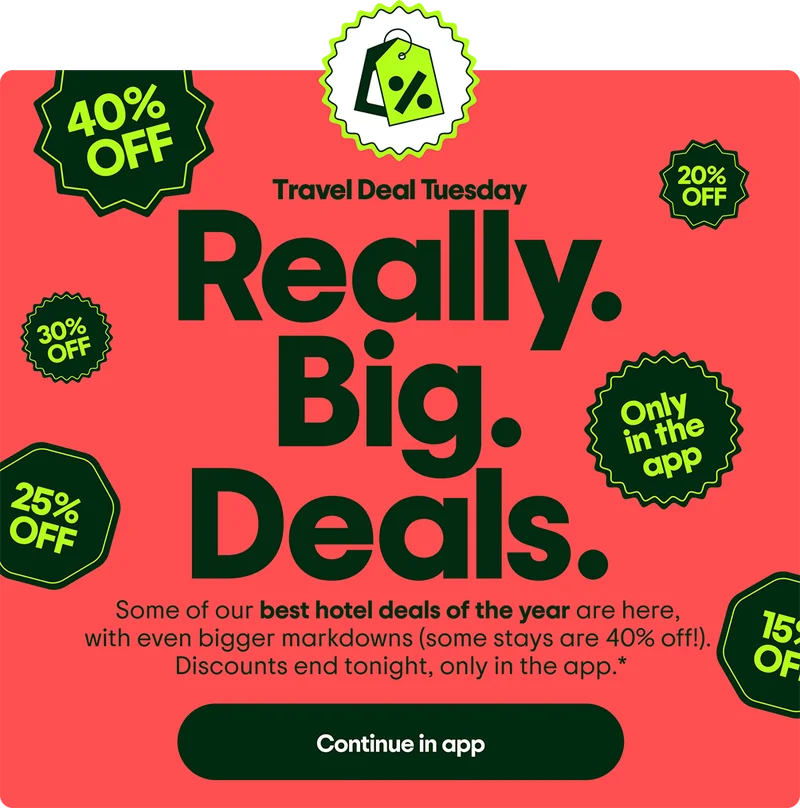 Travel Deal Tuesday. Really. Big. Deals. Some of our best hotel deals of the year are here, with even bigger markdowns (some stays are 40% off!). Discounts end tonight, only in the app.* Image Description: Floating badges with various percent off discounts. Continue in app.