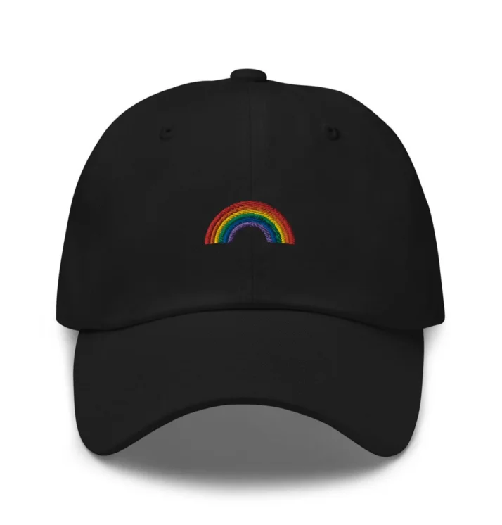 A black cap with a rainbow on the front