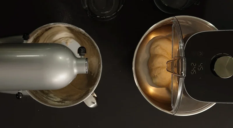 A planetary mixer next to Ooni Halo Pro