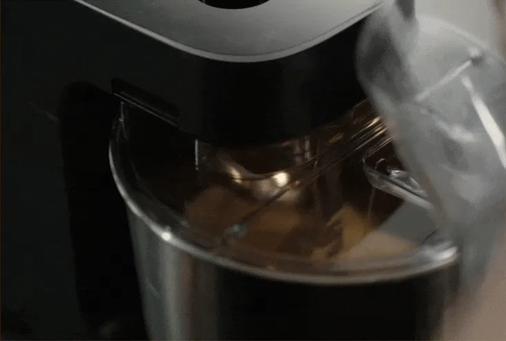 Halo mixing dough into a pumpkin shape