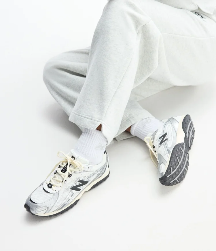 Sydeon's legs pictured in New Balance 204L shoes (U204LSWD)