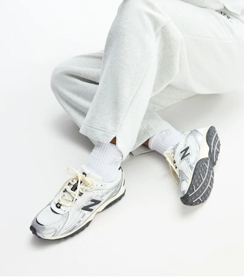Sydeon's legs pictured in New Balance 204L shoes (U204LSWD)