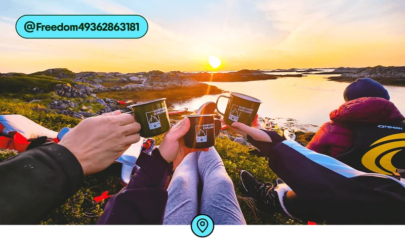 Image description: A group toasting with mugs in front of a sunset, photo taken by @Freedom49362863181