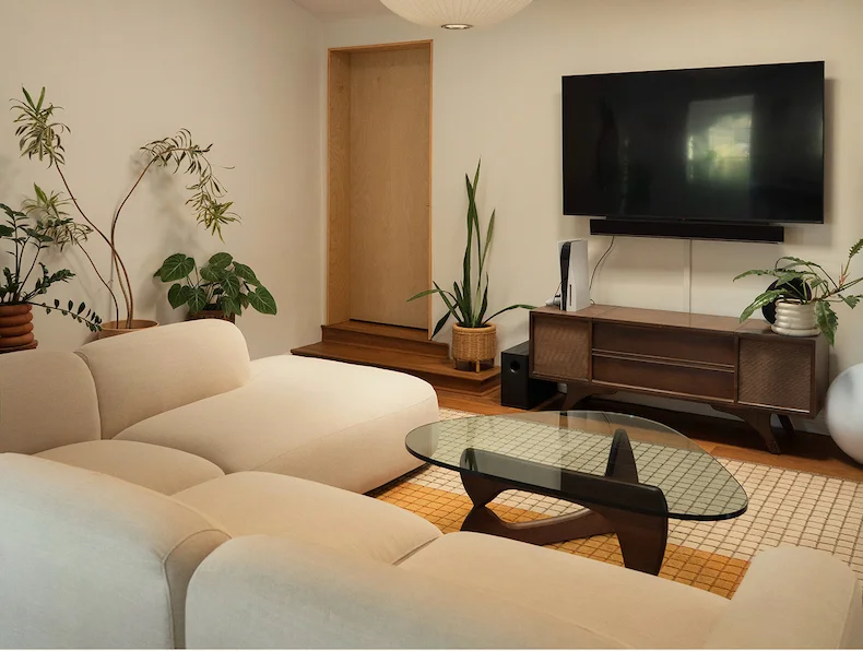 The Soft Serve Sectional in Crypton Nomad Crema, styled in Toshiko Shek's hillside LA living room.