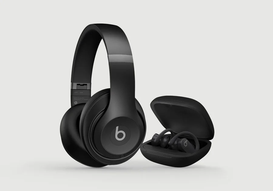 Beats Studio Pro in Navy and Beats Studio Buds + in Transparent.