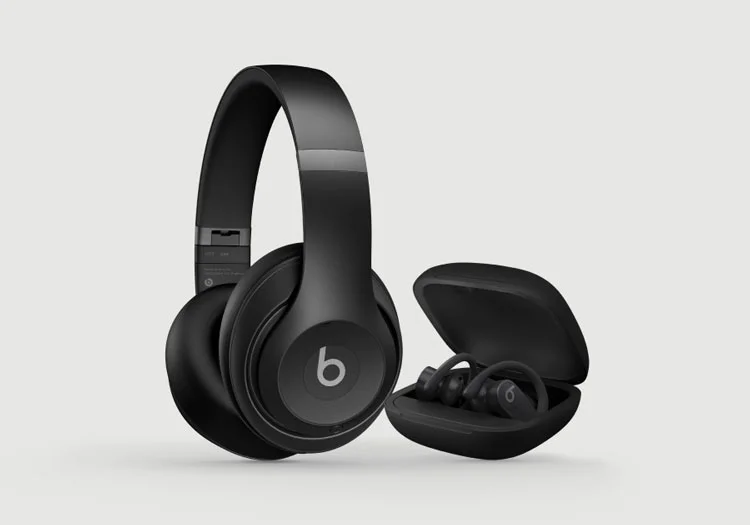 Beats Studio Pro in Navy and Beats Studio Buds + in Transparent.