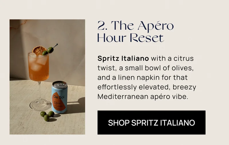 2. The Apéro  Hour Reset | Spritz Italiano with a citrus  twist, a small bowl of olives,  and a linen napkin for that effortlessly elevated, breezy Mediterranean apéro vibe.  | Shop Spritz Italiano