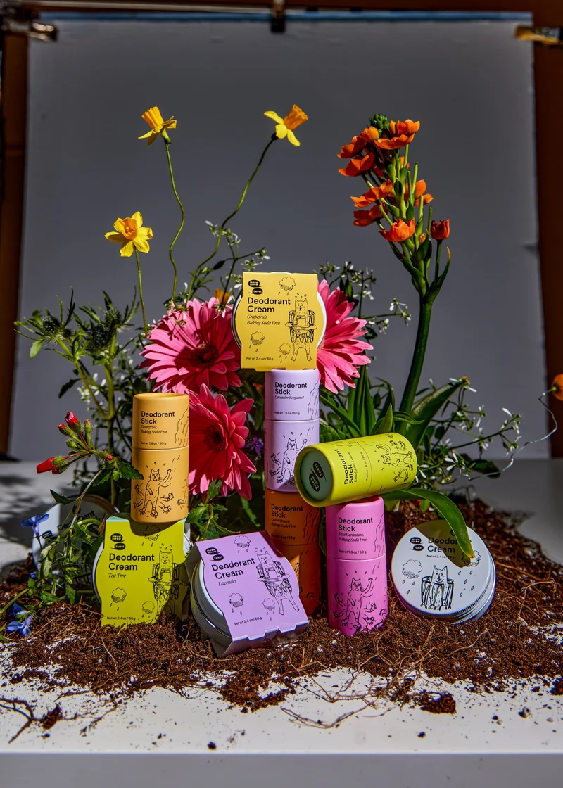 A collection of products is arranged with ceramic body parts on a messy table