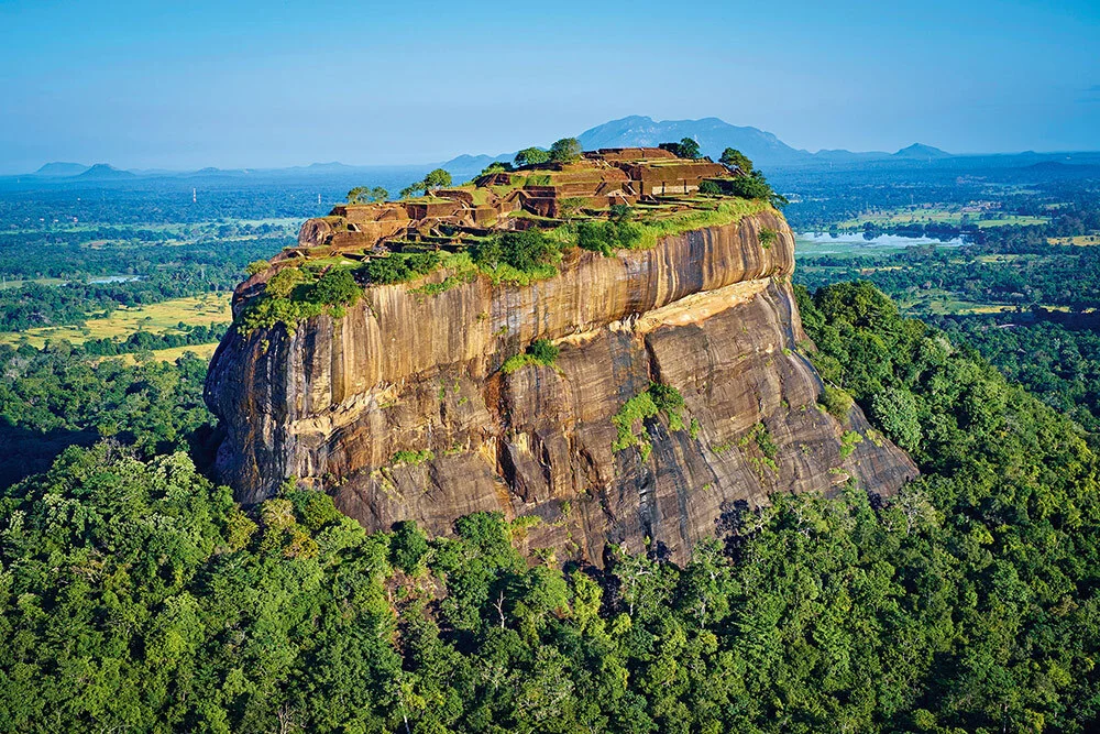 Jungle swathes the eastern face of the Sigiriya rock, topped with the citadel built by King Kashyapa I in the late fifth century A.D. in central Sri Lanka