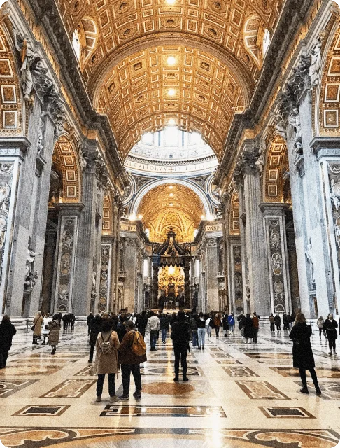 Image Description: Groups of travelers marveling at the gold-coffered ceilings of St. Peter’s Basilica