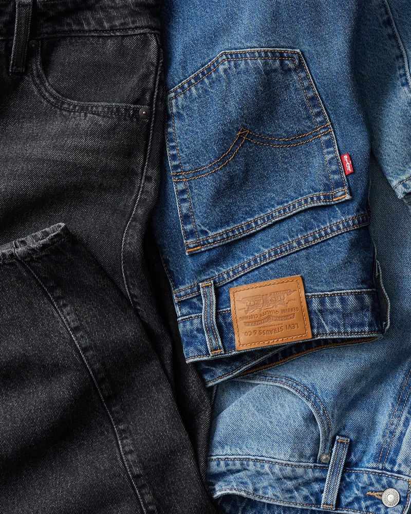 Flat lay of jeans in different washes