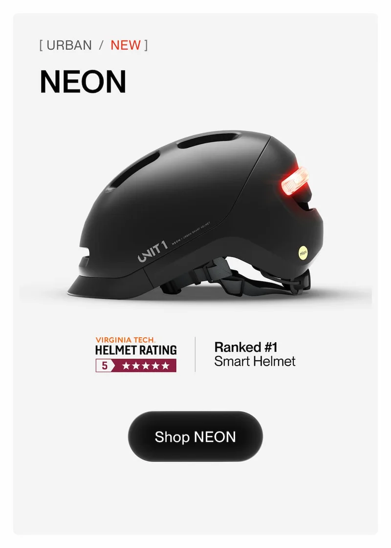UNIT 1 NEON urban smart helmet with integrated rear light. Rated 5 stars by Virginia Tech. Button: Shop NEON.