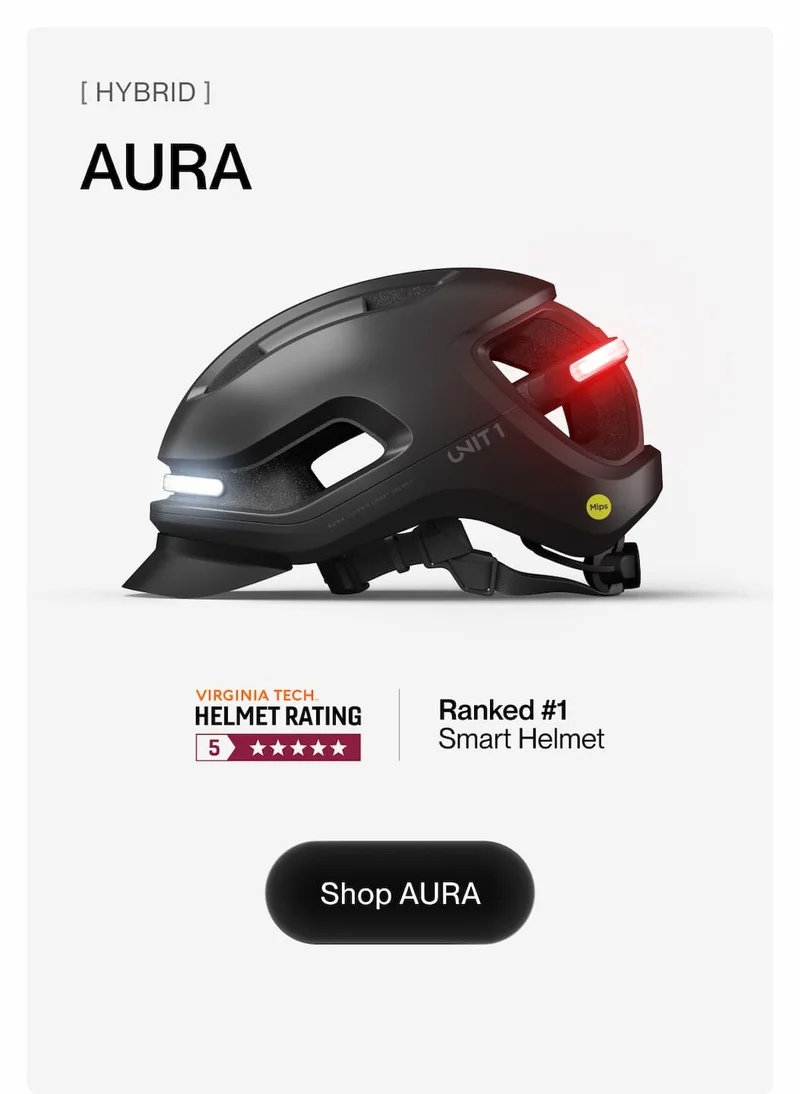 UNIT 1 AURA hybrid smart helmet with front and rear LED lights. Rated 5 stars by Virginia Tech. Button: Shop AURA.
