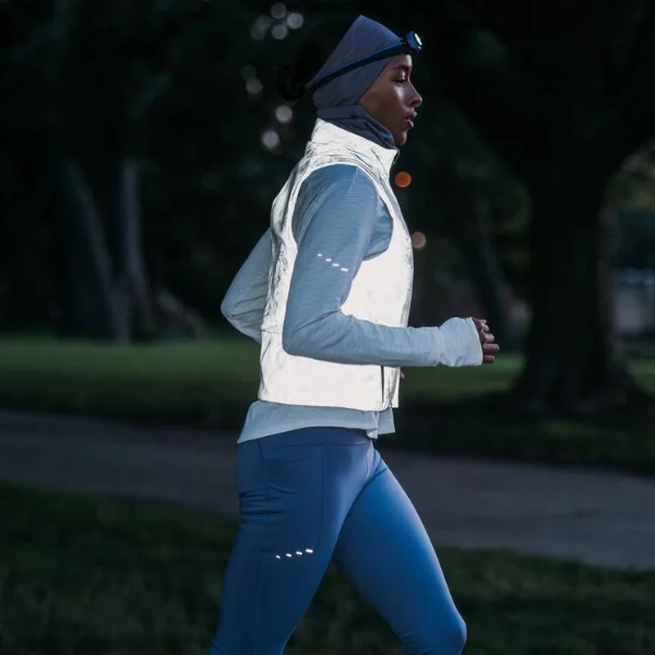 Woman running in the dark
