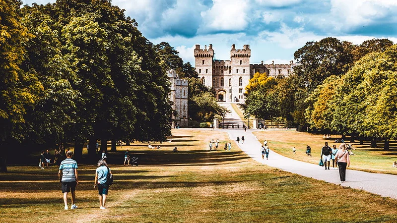 Image description: Tourists walking outside Windsor Castle.
