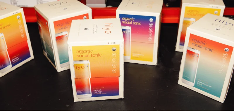 photo: hiyo 4-packs on the checkout conveyor belt.
