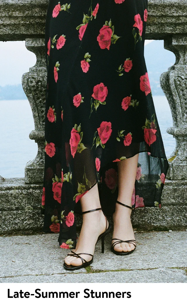 A woman wearing strappy high heels.