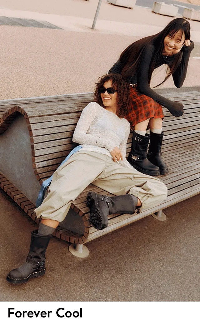 Women wearing Dr. Martens boots.