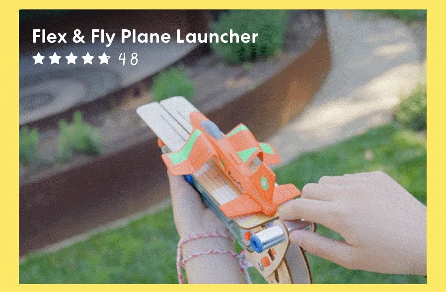 Close-up of hand launching a foam plane using the Flex & Fly Plane Launcher (GIF), rating 4.8 stars