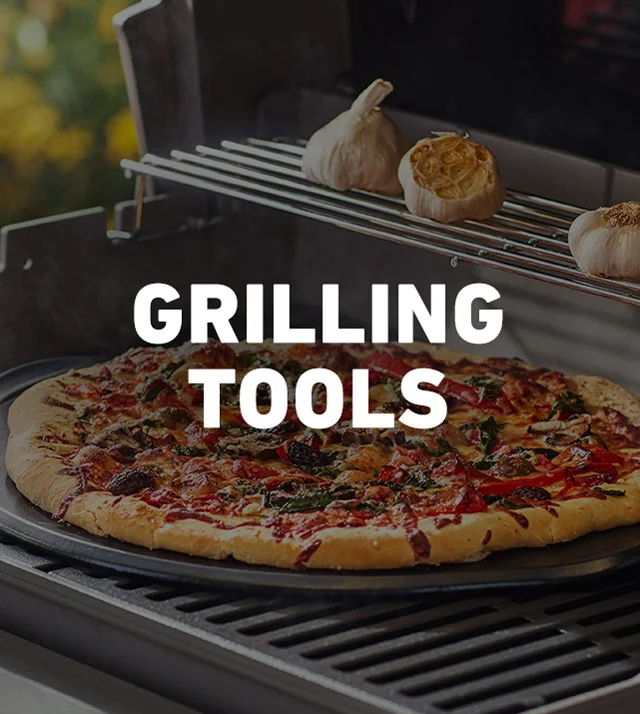 image of pizza and garlic cooking on grill