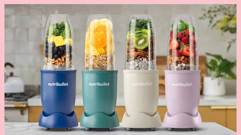The 4 nutribullet Pro Haven colors collection lined up on top of a kitchen countertop.