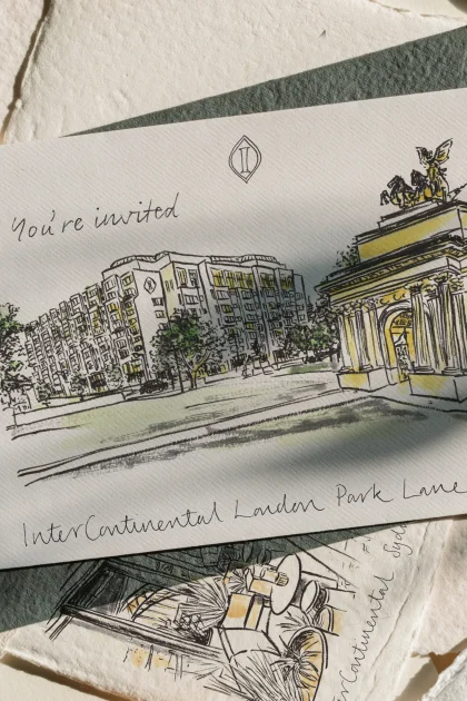 Stack of watercolor cards of hotels, including InterContinental London Park Lane, with the message:You're invited.