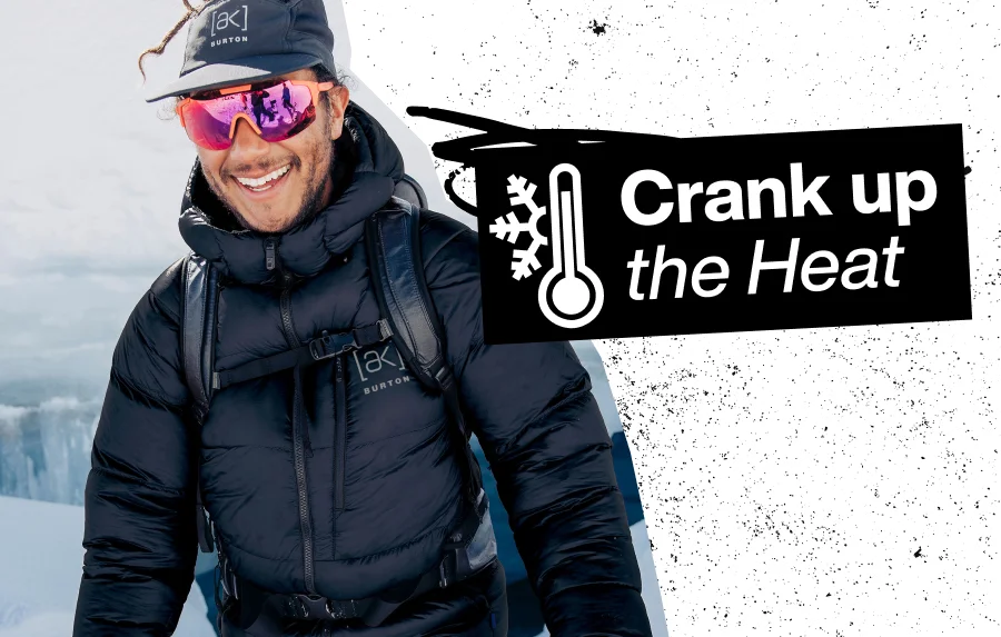 Model wearing the [ak] Expediton jacket with the text 'Crank Up the Heat'.