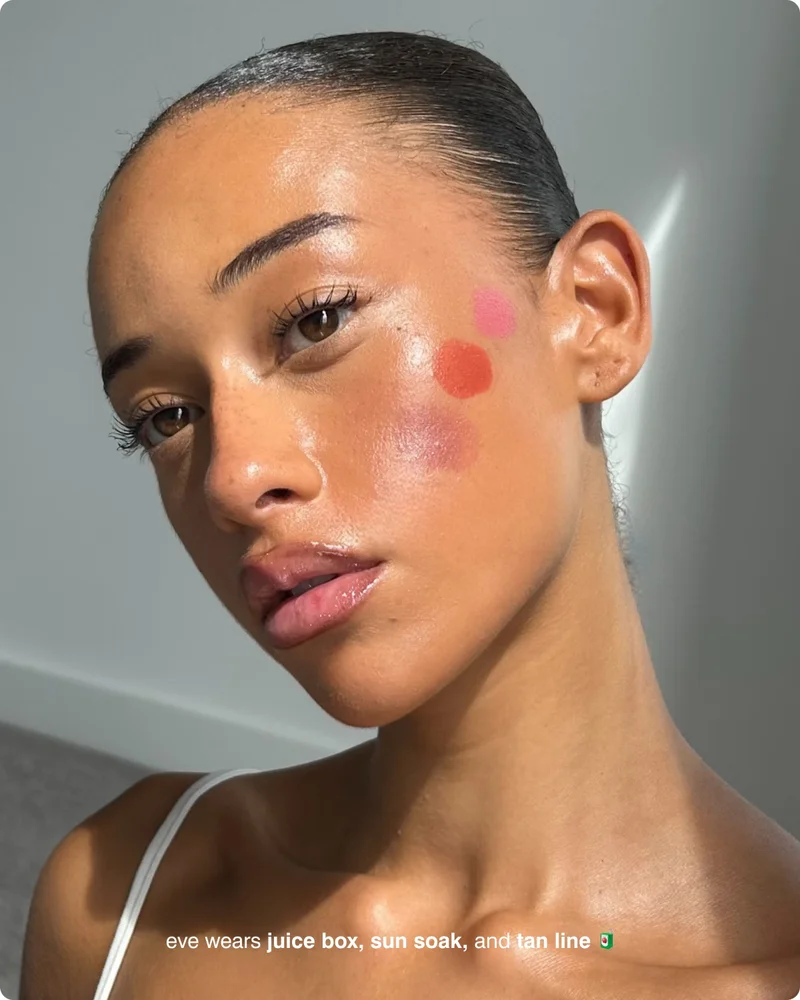 eve wears juice box, sun soak, and tan line