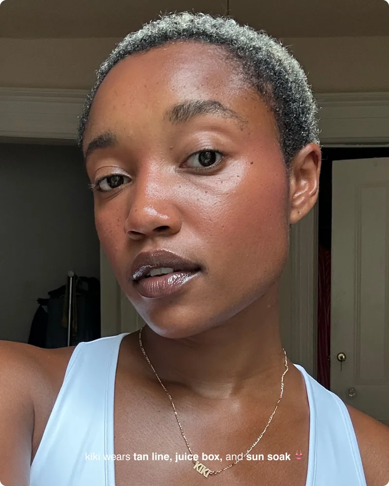 kiki wears tan line, juice box, and sun soak